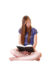 Image showing Girl reading book.