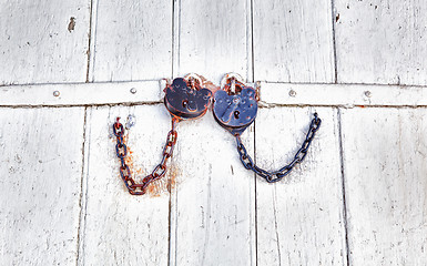 Image showing Antique locks and chain on wood