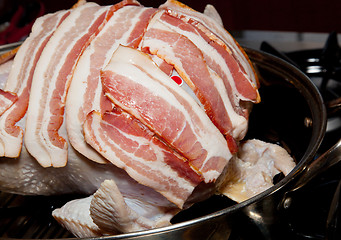 Image showing Bacon laid on turkey for roasting