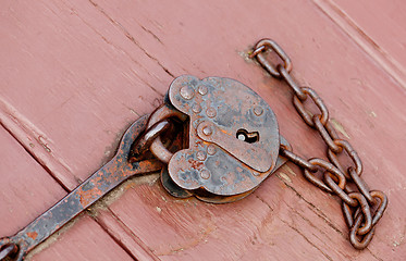 Image showing Antique lock and chain on wood