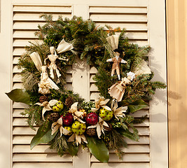 Image showing Traditional xmas wreath on front door