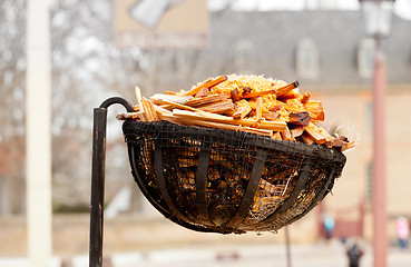 Image showing Old firewood lamp in street