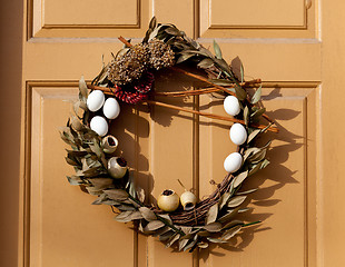 Image showing Traditional xmas wreath on front door