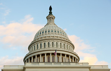 Image showing Flag flies in front of Capitol in DC