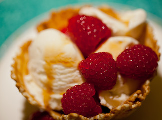 Image showing Macro of raspberry and ice-cream