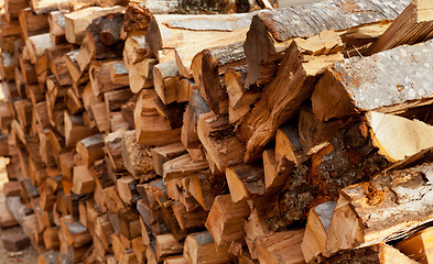 Image showing Stack of wooden logs for firewood