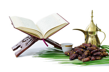 Image showing Thge Holy Quran with Dates Fruit and Arabic Coffee Pot