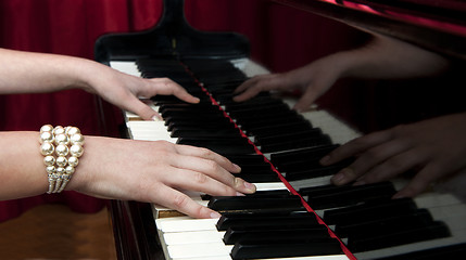 Image showing Hands on Grand Piano