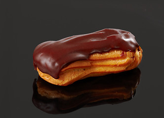 Image showing eclair on black background