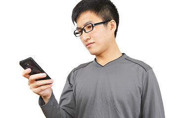 Image showing man writting SMS on mobile phone