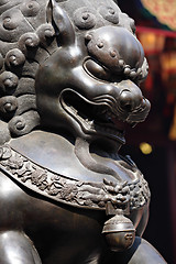 Image showing Bronze lion in chinese temple