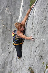 Image showing Rock climber in a steep cliff