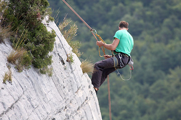 Image showing Descent of a rock climber