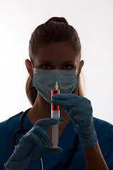 Image showing silhouette of a nurse with syringe