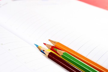 Image showing Color pencil and agenda