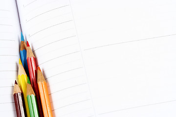 Image showing Color pencil and agenda