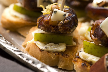 Image showing Appetizer Plate with Dactyl, Pecan nuts and Cheese