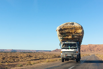 Image showing overloaded truck on highway, morocco