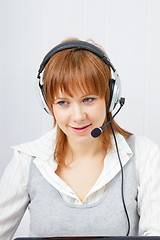 Image showing girl in headphones with a microphone