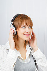 Image showing The girl in headphones