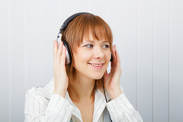 Image showing The girl in headphones