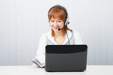 Image showing girl with laptop in headphones