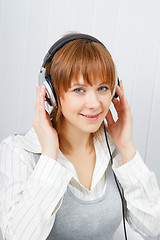 Image showing The girl in headphones