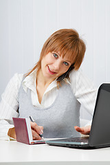 Image showing Attractive happy girl. Office