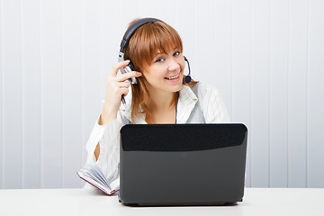 Image showing girl in headphones with a microphone