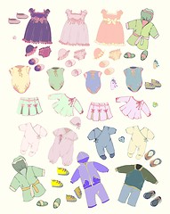 Image showing Set of children's clothes. Illustration of clothes for boys and for girls.