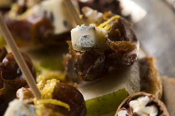 Image showing Appetizer Plate with Dactyl, Pecan nuts and Cheese