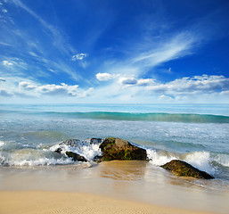 Image showing stones in the waves on ocean coast