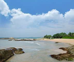 Image showing stones in the waves on ocean coast