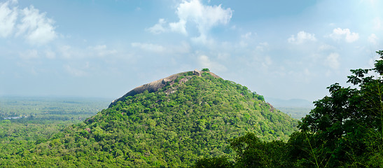 Image showing view from  mount Sigiriya  into mountain in the shape of the fem