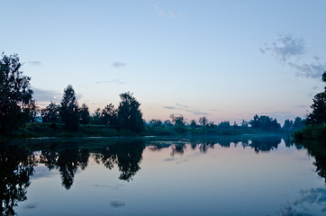 Image showing sunset on a mountain lake
