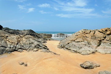 Image showing stones in the waves on ocean coast