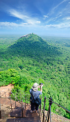 Image showing View from mount Sigiriya, Sri Lanka (Ceylon) with tourist on sho