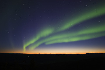 Image showing 3 aurora strips over twilight