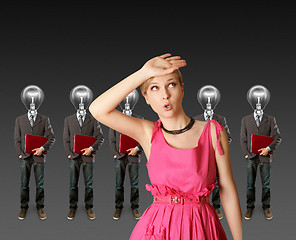 Image showing woman and lamp head businesspeople with laptop