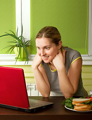Image showing tender pregnant female with laptop