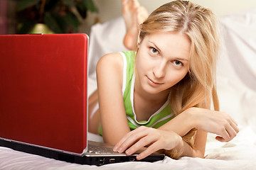 Image showing woman in bed with laptop