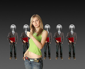 Image showing woman and lamp head businesspeople with laptop