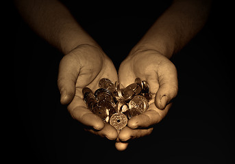 Image showing A hand og money