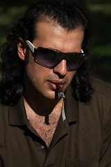 Image showing Person Smoking a Cigar