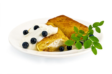Image showing Pancakes with cottage cheese and blueberries on the plate