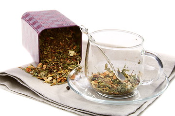 Image showing Set of dried herbs, fruits and spices in tea cup.