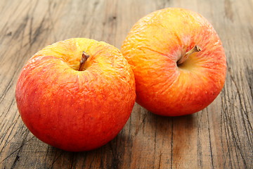 Image showing Two shriveled apples.