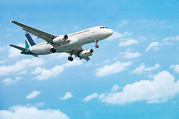 Image showing Airliner on the cloudy sky