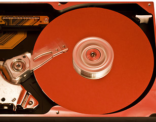 Image showing red platter from open hard drive