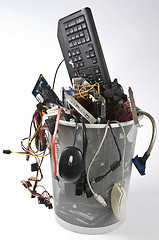 Image showing electronic scrap in trash can